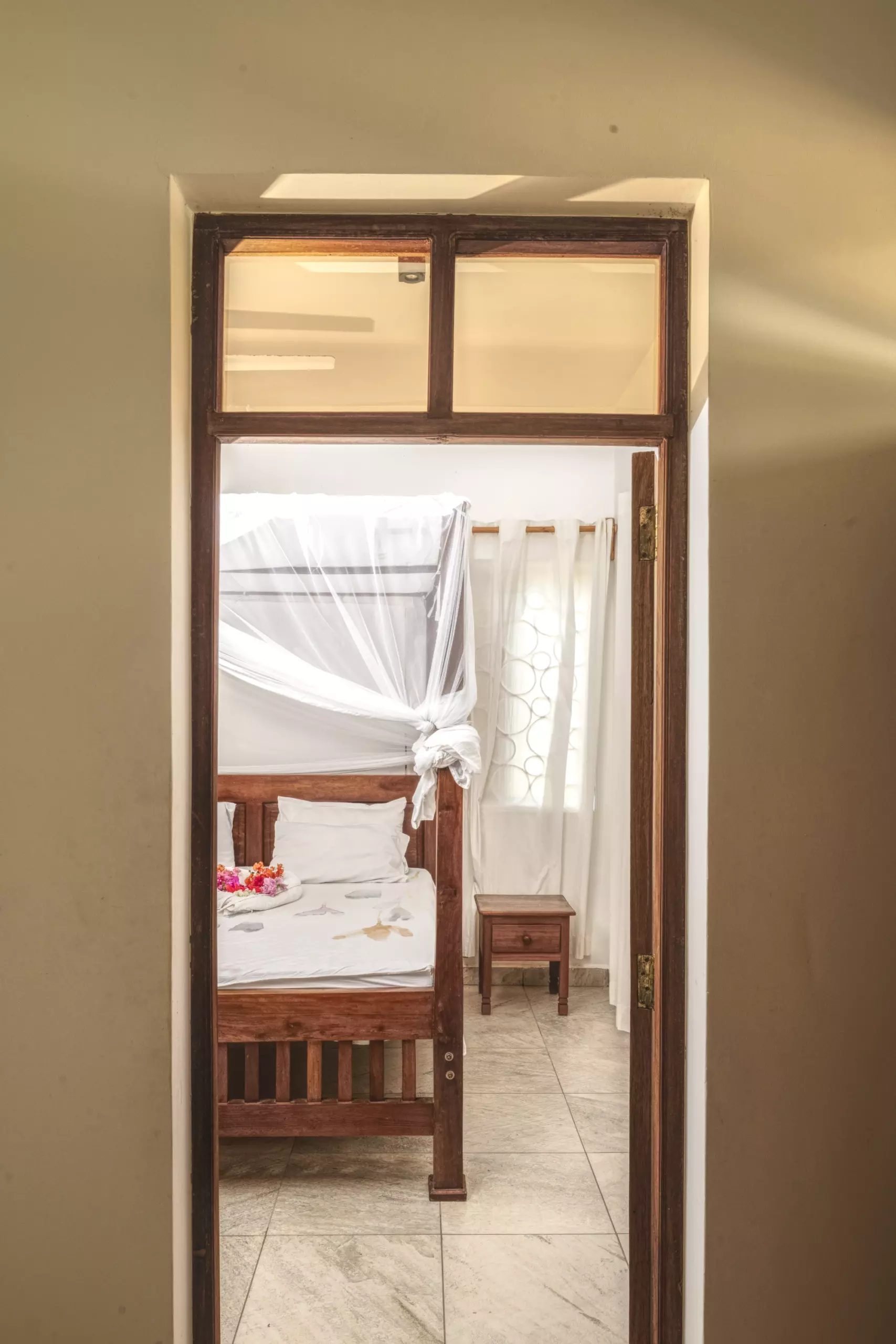 Artistic corridor and bedroom shot at Dacha Diani apartments